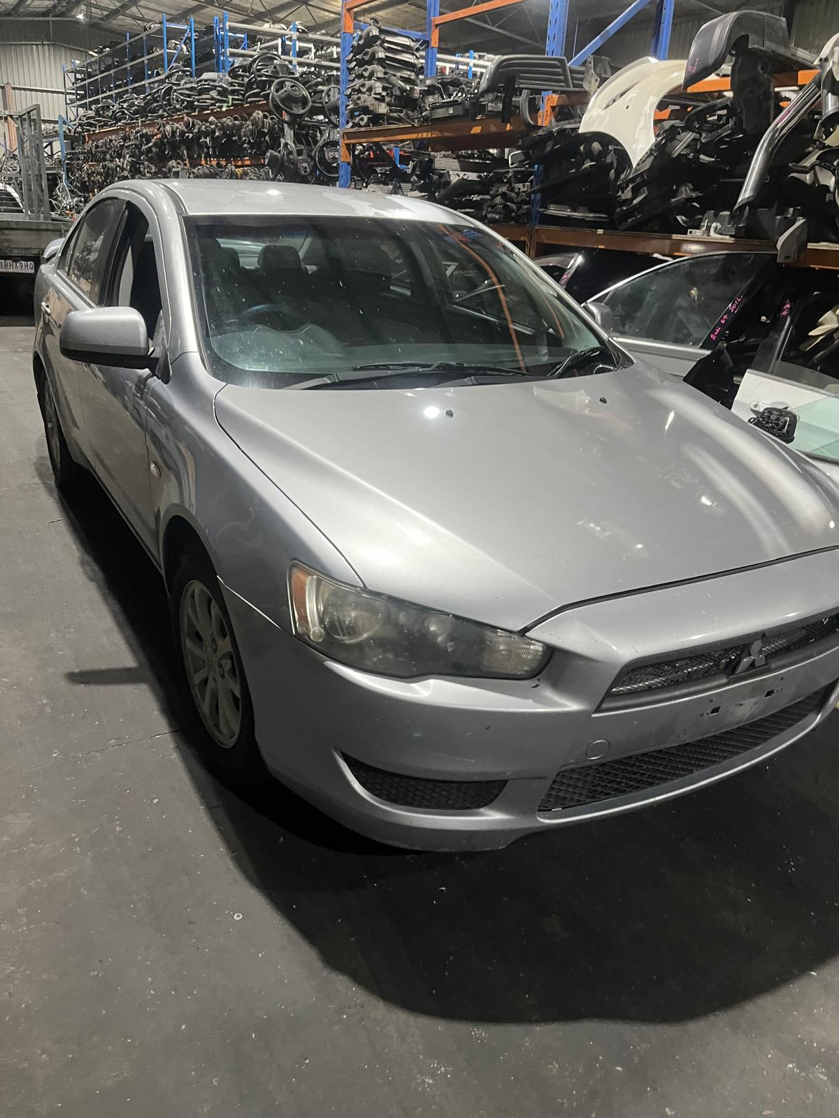 Wrecking/Dismantling Mitsubishi Lancer CJ 2011 Sedan Silver 2l petrol Fwd auto