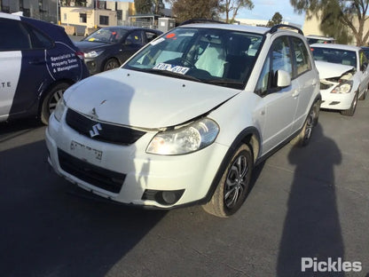 SUZUKI SX4 RW420 2009 white - Left Front Door - AU-219-SZ-4LP-D-A
